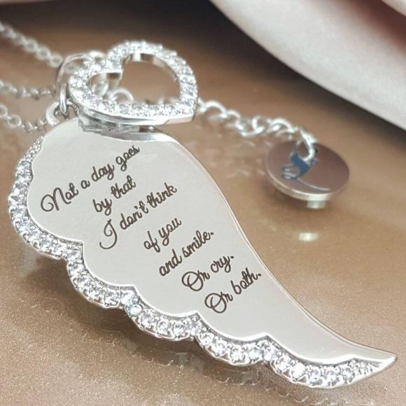 <img src="Not_A_Day_Goes_By_Angel_Wing_Necklace_1.jpg" alt="Angel Jewelry - Not A Day Goes By Angel Wing Necklace - 1">